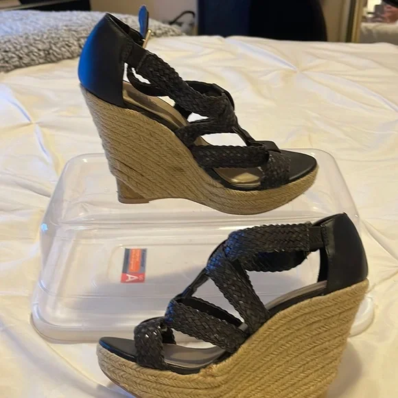 Women’s wedges tan and black gently worn buckle close